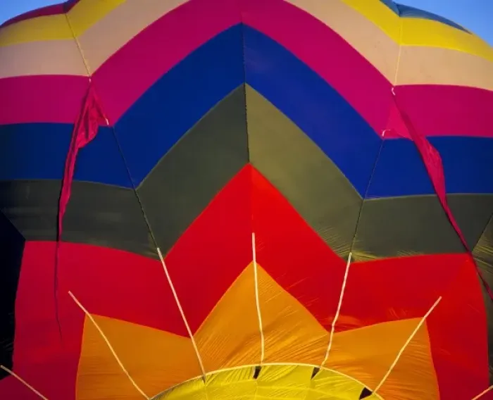 Framed Print : USA, Idaho, Teton Valley. The wildly-colored fabric of this hot-air balloon spices Framed Print : USA, Idaho, Teton Valley. The wildly-colored fabric of this hot-air balloon spices