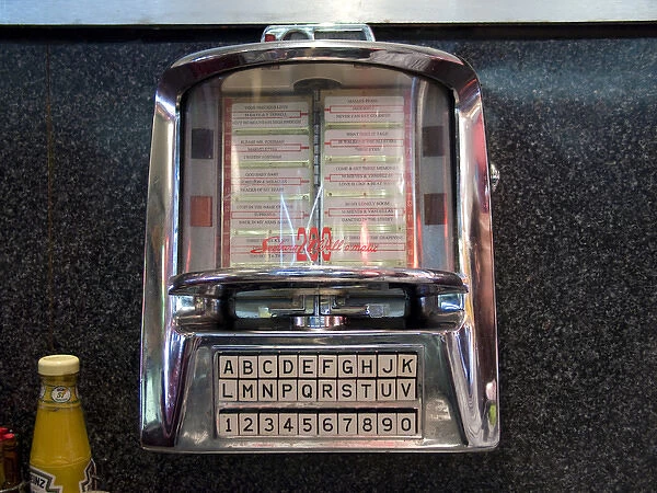 USA, Illinois, Chicago. Old-time tableside jukebox at a nostalgic diner. Credit as