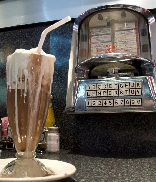 USA, Illinois, Chicago. Old time tableside jukebox and milkshake beverage at a nostalgic diner