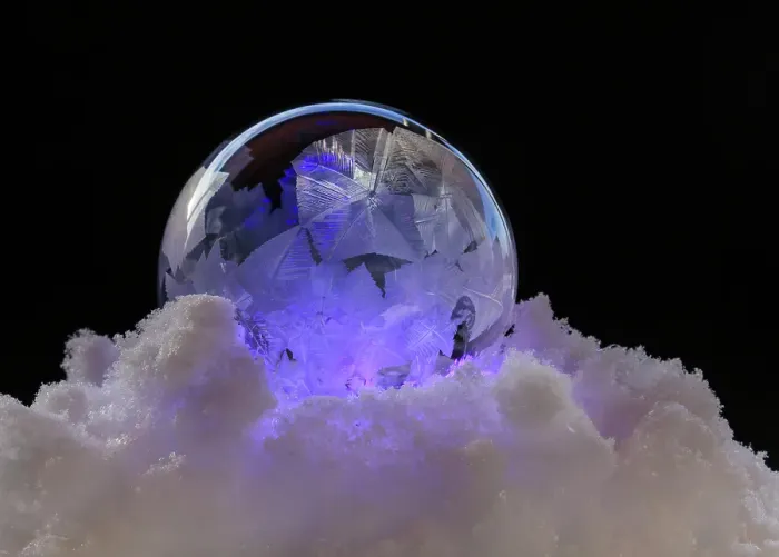 Framed Print : USA, Indiana, Carmel. Close-up of frozen soap bubble and snow. ©Wendy Kaveney  /  Jaynes Gallery  /  DanitaDelimont.com