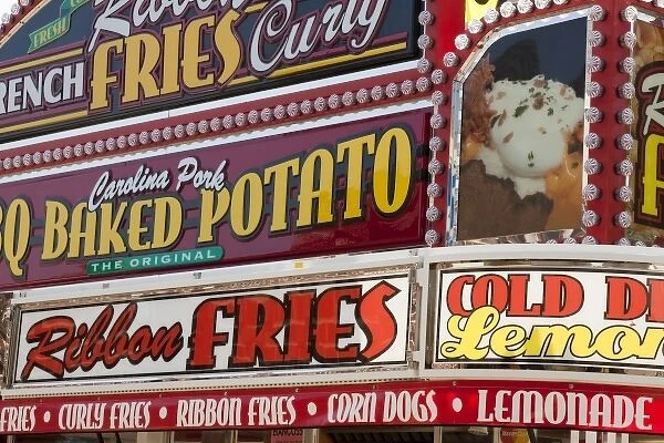 USA, Indiana, Indianapolis. Food vendor signs at the Indiana State Fair