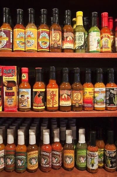 USA, Louisiana, New Orleans. Bottles of various hot-sauces