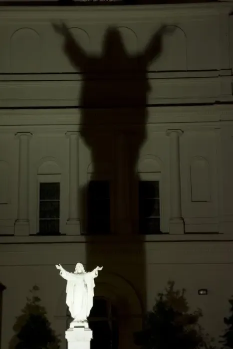 Framed Print : USA, Louisiana, New Orleans. Night scene of illuminated statue of Christ casting Framed Print : USA, Louisiana, New Orleans. Night scene of illuminated statue of Christ casting