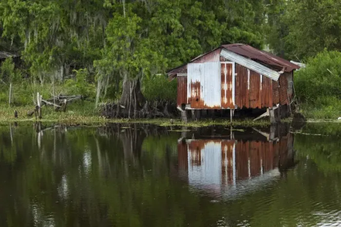 Framed Print : USA, Louisiana, New Orleans, Old fishing shack in cypress forest lining bayou along Framed Print : USA, Louisiana, New Orleans, Old fishing shack in cypress forest lining bayou along