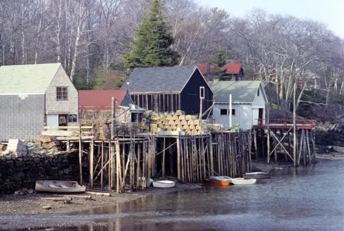 Framed Print : USA, Maine, Acadia NP. Lobster traps are stacked on the piers in a village near Acadia