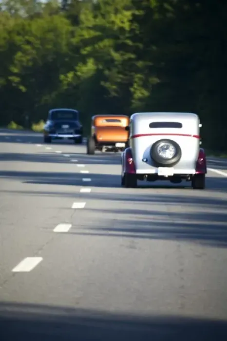 Framed Print : USA, Maine. Three antique cars traveling on a modern highway