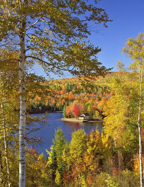 USA, Maine, Bingham. Wyman Lake and autumn colors