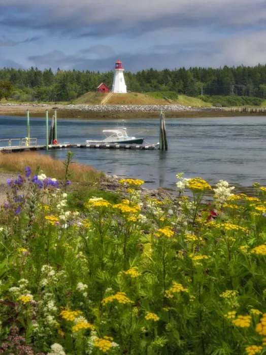 Framed Print : USA, Maine, Lubec. Mulholland Point Lighthouse as seen from the town of Lubec, Maine