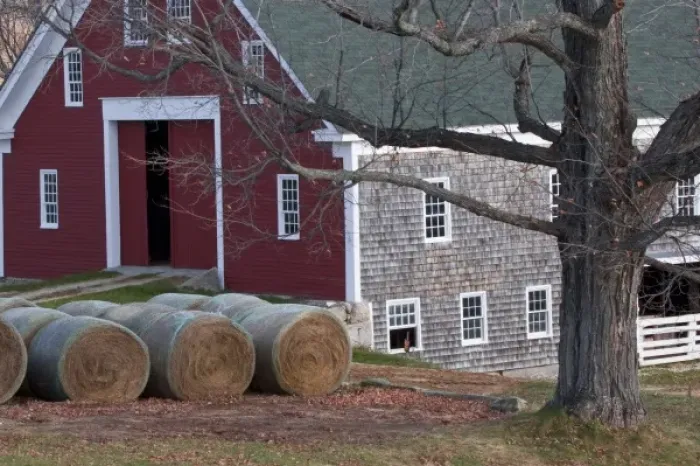 Framed Print : USA, Maine, New Gloucester. Hay bales sitting outside a barn at Shaker Village