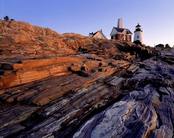 USA, Maine, Pemaquid Light. A pink sunrise washes the rocks near Pemaquid Light, Lincoln Co