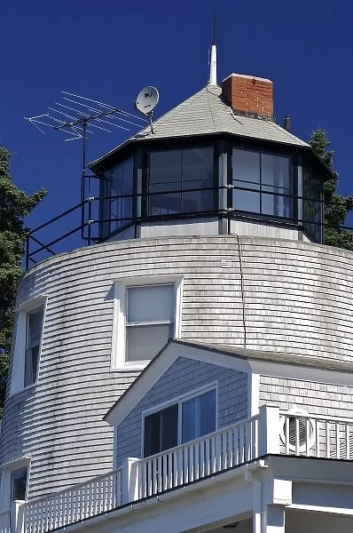 USA, Maine, Schoodic Peninsula. A lighthouse-like roof on a shingled house overlooking