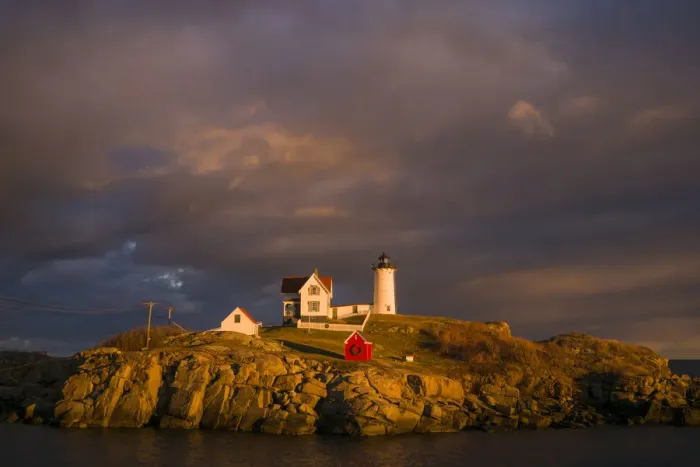 Framed Print : USA, Maine, York Beach, Nubble Light Lighthouse with Christmas decorations, sunset Framed Print : USA, Maine, York Beach, Nubble Light Lighthouse with Christmas decorations, sunset