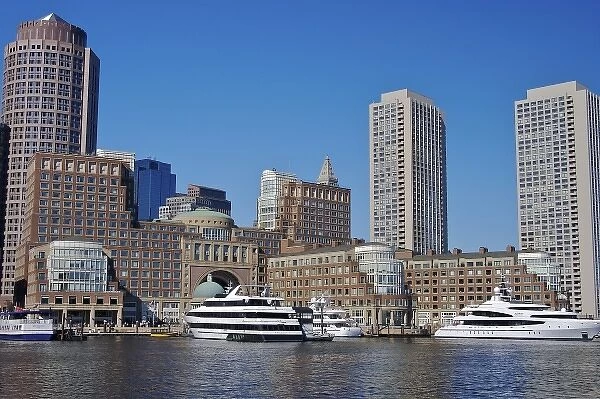 USA, Massachusetts, Boston. Boats and the skyline at Rowes Wharf
