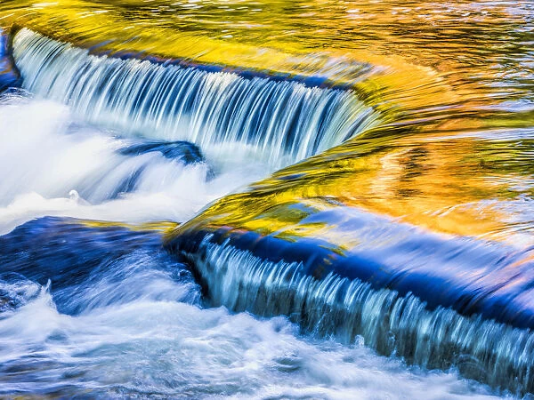 USA, Michigan. Ottawa National Forest, smooth water reflecting fall foliage, Middle