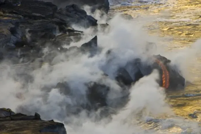 Framed Print : USA. Molten lava flows into the ocean at sunrise in Volcanoes NP on the Big Island of Hawaii Framed Print : USA. Molten lava flows into the ocean at sunrise in Volcanoes NP on the Big Island of Hawaii