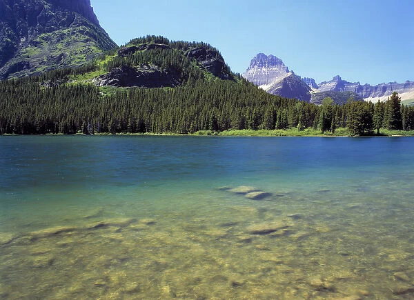 USA, Montana, Glacier NP. Swiftcurrent Lake offers a variety of colors to please
