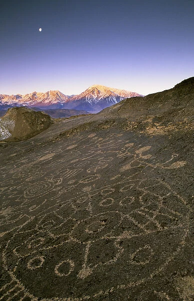 USA, Nevada. Circular petroglyphs at the edge of the Great Basin, with the Sierra