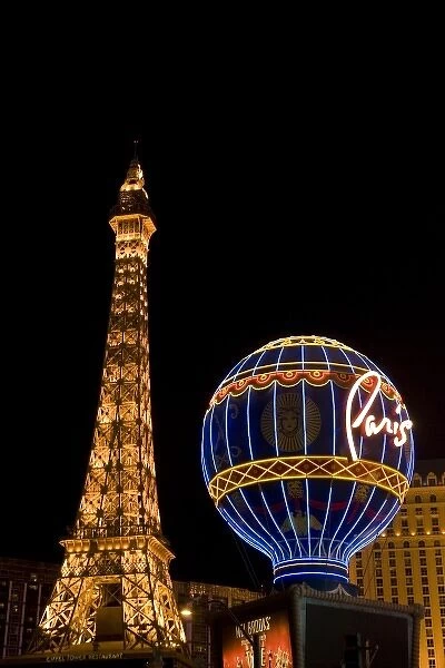 USA, Nevada, Las Vegas. Paris Las Vegas Hotel & Casino lit at night