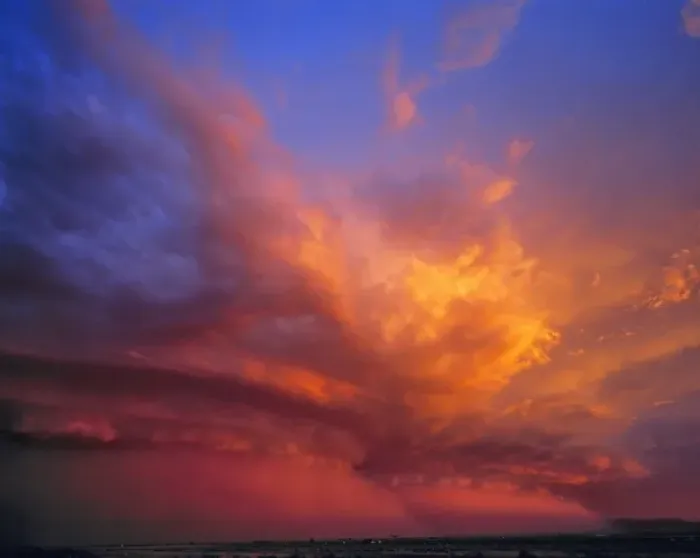 Framed Print : USA, Nevada. Storm clouds color with the setting sun over the Nevada desert