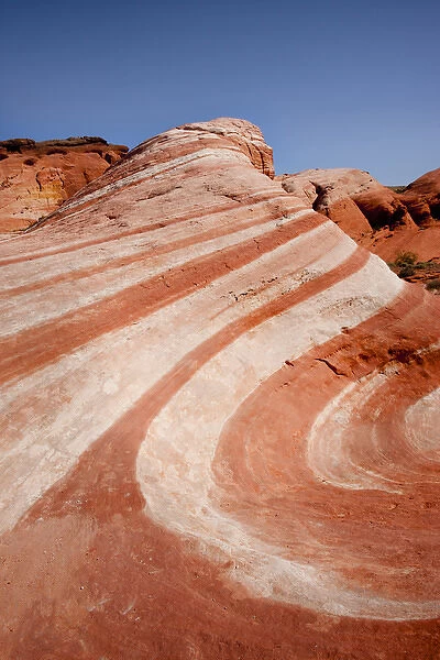USA, Nevada, Valley of Fire State Park. Striped sandstone formation resembles a wave of stone