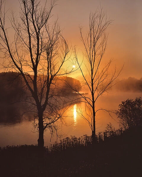USA, New England, Maine. Autumn sunrise over the Kennebec River. Credit as: Steve
