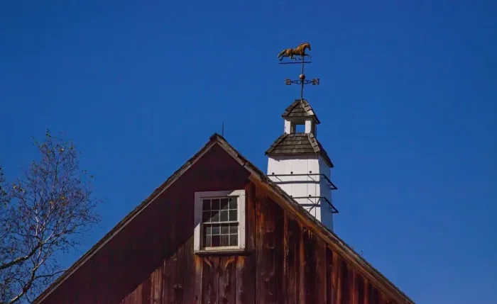 Framed Print : USA, New England, Vermont weather vane on top of wooden barn topped with horse