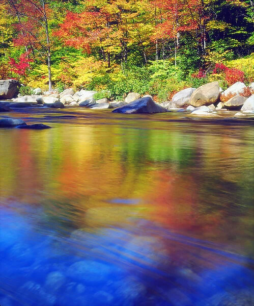 USA, New Hampshire, Autumn colors reflecting in the Swift River