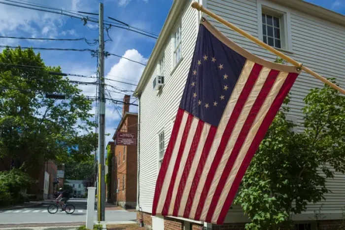 Framed Print : USA, New Hampshire, Portsmouth, Strawberry Banke Historic Area, building with US flag Framed Print : USA, New Hampshire, Portsmouth, Strawberry Banke Historic Area, building with US flag