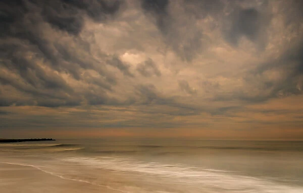 USA, New Jersey, Cape May National Seashore. Stormy seascape at sunrise. Credit as