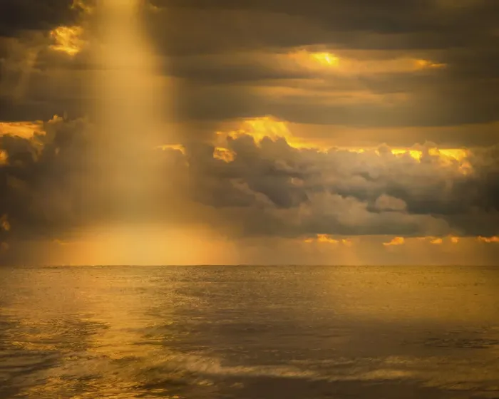 Framed Print : USA, New Jersey, Cape May National Seashore. Sunlight through storm clouds over ocean