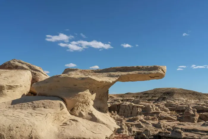 Framed Print : USA, New Mexico, Bisti / De-Na-Zin Wilderness. Mudstone protruding formation in badlands
