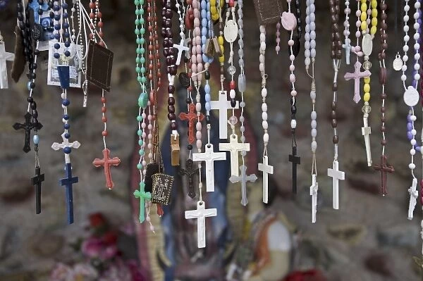 USA, New Mexico, Chimayo. Religious artifact left by believers at El Santuario de Chimayo