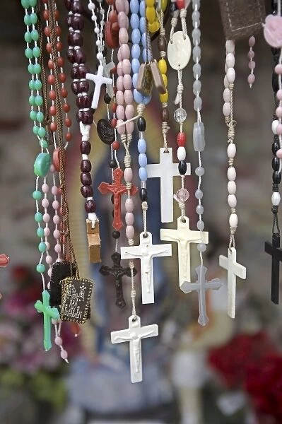 USA, New Mexico, Chimayo. Religious artifact left by believers at El Santuario de Chimayo