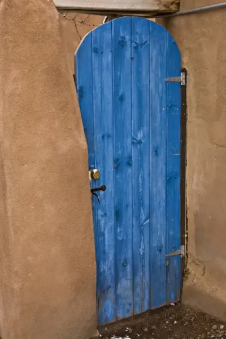 Framed Print : USA, New Mexico, Santa Fe. Blue door contrasts with tan adobe building Framed Print : USA, New Mexico, Santa Fe. Blue door contrasts with tan adobe building