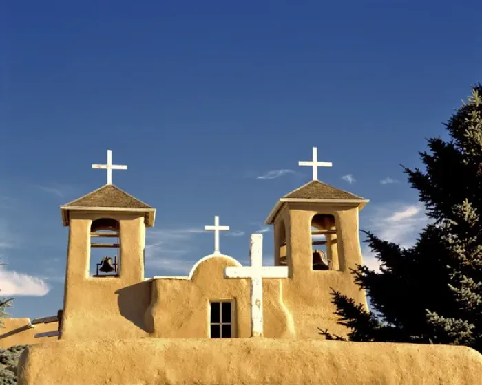 Framed Print : USA, New Mexico, Taos. Simple white crosses top the bell towers of St. Francis de Assisi Church
