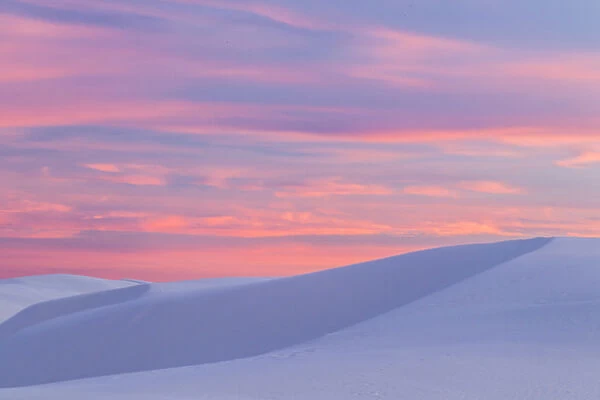 USA, New Mexico, White Sands National Monument. Sunset on desert sand. Credit as