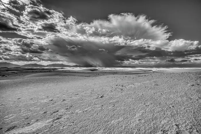 Framed Print : USA, New Mexico, White Sands National Park. Black and white of thunderstorm over desert and San Andres Mountains