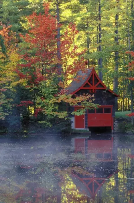 Framed Print : USA, New York, Adirondack Mountains. Boathouse and autumn reflections in lake. Credit as