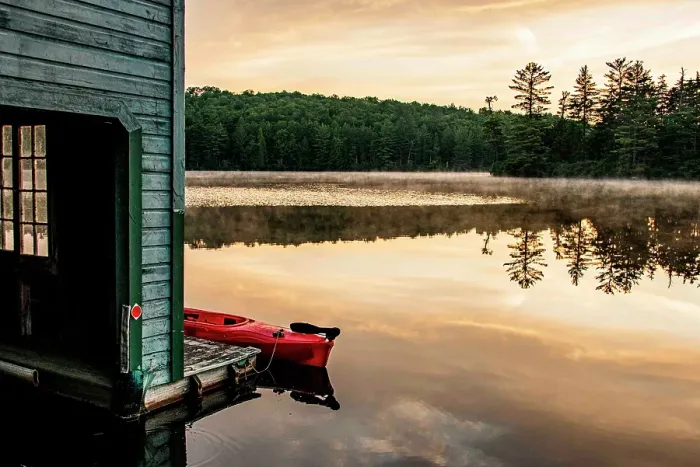 Framed Print : USA, New York. Adirondack Park (National Historic Landmark), Saranac Lake, Hoel Pond, canoe at boathouse dock Framed Print : USA, New York. Adirondack Park (National Historic Landmark), Saranac Lake, Hoel Pond, canoe at boathouse dock