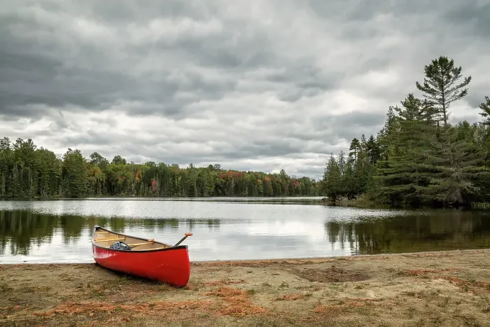Framed Print : USA, New York, Adirondacks. Lake Abanakee, Red canoe on Chain Lakes Bathing Beach Framed Print : USA, New York, Adirondacks. Lake Abanakee, Red canoe on Chain Lakes Bathing Beach