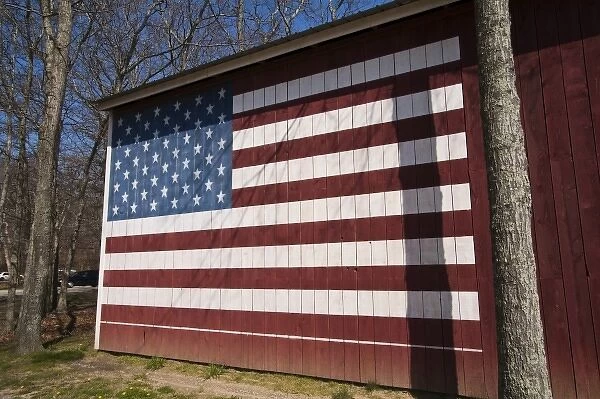 USA, New York, East Hampton. Barn with USA flag in the hamlet of Springs