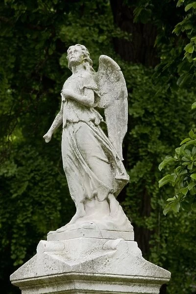 USA, New York, New York City, Marble angel statue atop family grave in Greenwood