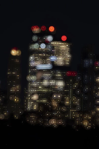 USA, New York. New York City skyline at night double exposure