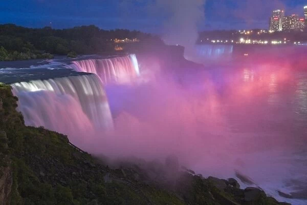 USA, New York, Niagara Falls. Close-up view at twilight of the waterfalls and mist