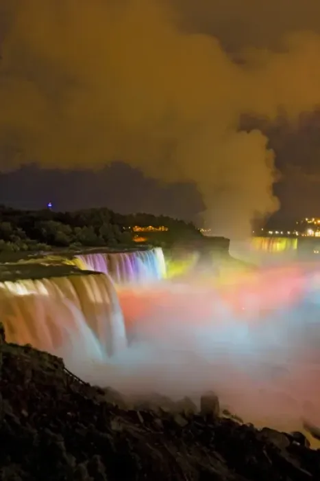 Framed Print : USA, New York, Niagara Falls. Nighttime view of the waterfalls and mist lit with colored lights