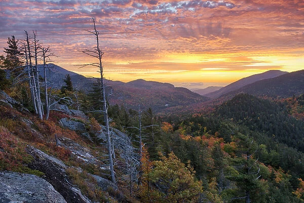 USA, New York State. Sunrise on Mount Baxter in autumn, Adirondack Mountains