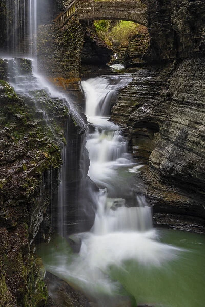 USA, New York, Watkins Glen. Waterfall cascade over rock