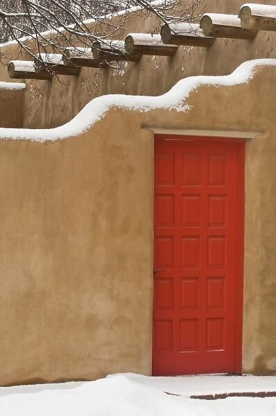 USA, NM, Santa Fe, Snow on Adobe House