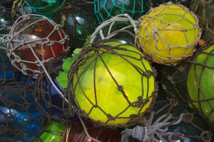 Framed Print : USA; North America; Florida; Apalachicola; Colorful bouys draped in netting Framed Print : USA; North America; Florida; Apalachicola; Colorful bouys draped in netting