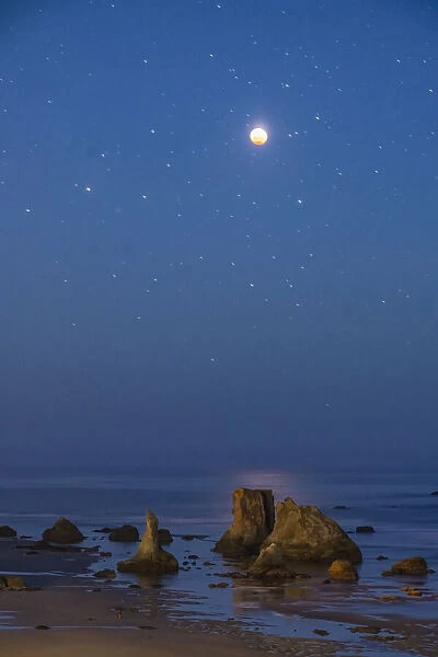 USA, Oregon, Bandon Beach. Lunar eclipse at night